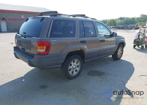 2001 Jeep Grand Cherokee Laredo from USA, damaged, VIN 1J4GW48S31C626727